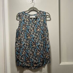 Blue and Black Sleeveless Blouse with Floral Design
